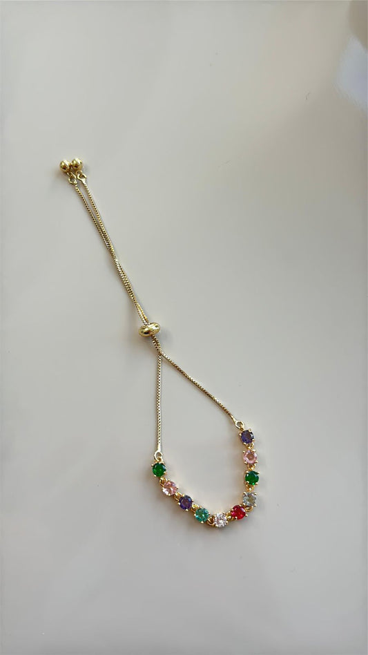 pulseira cravejada de pedras coloridas dourada com fecho em gravatinha