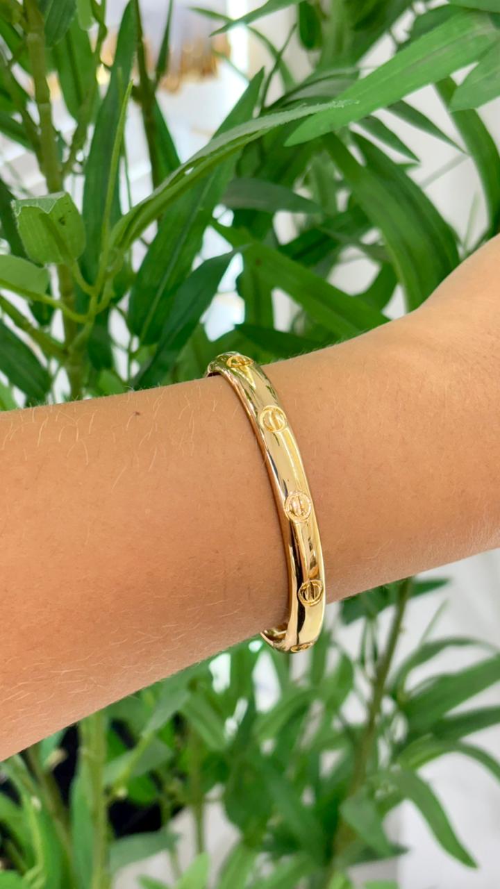 bracelete dourado cartier