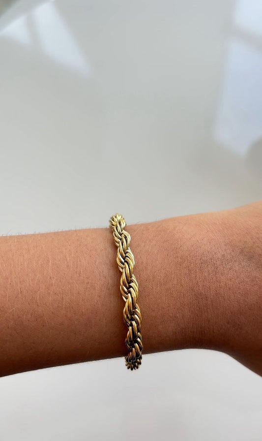 pulseira dourada grossa em aço inoxidável