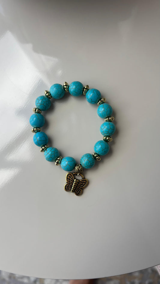 pulseira estilo boho azul com ouro envelhecido