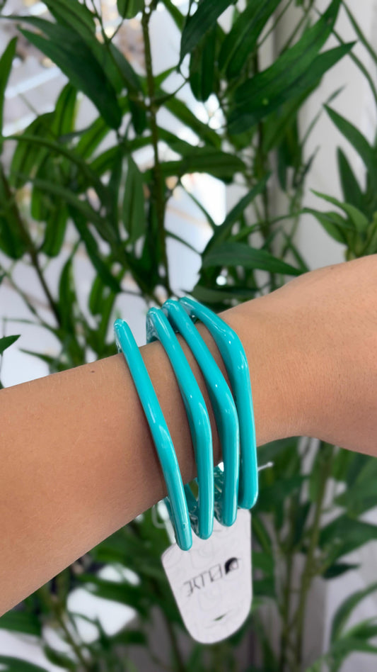 bracelete azul  claro transparente com 4 unidades