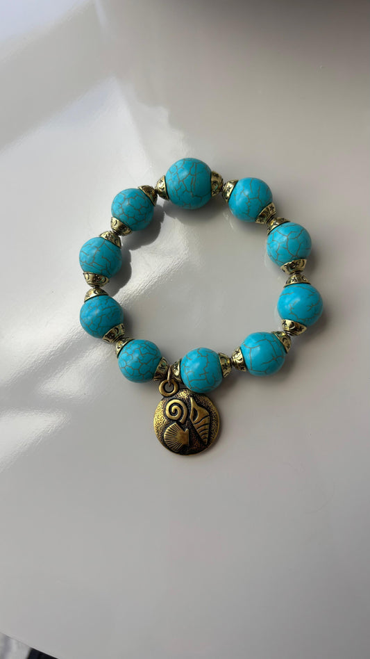 pulseira estilo boho azul com ouro envelhecido