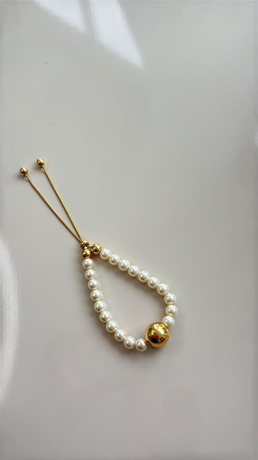 pulseira de pérola de fita dourada e bolas douradas com regulagem